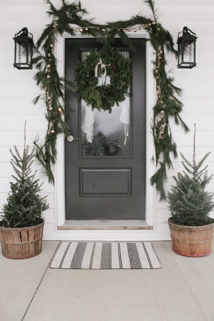 Festive Winter Porch Decor with Gold Jingle Bell Garland
