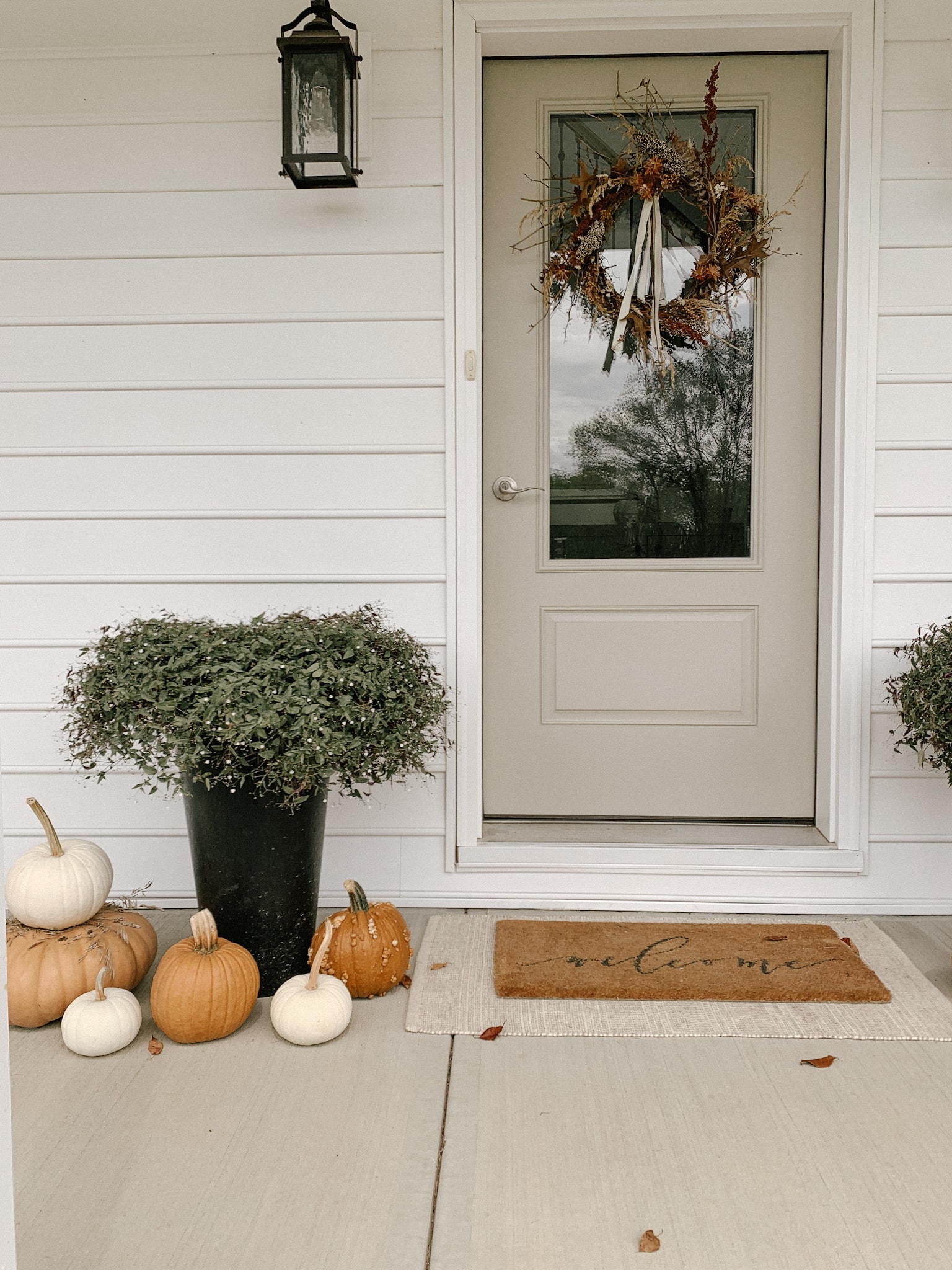 Natural Fall Porch with Orange and White Pumpkins